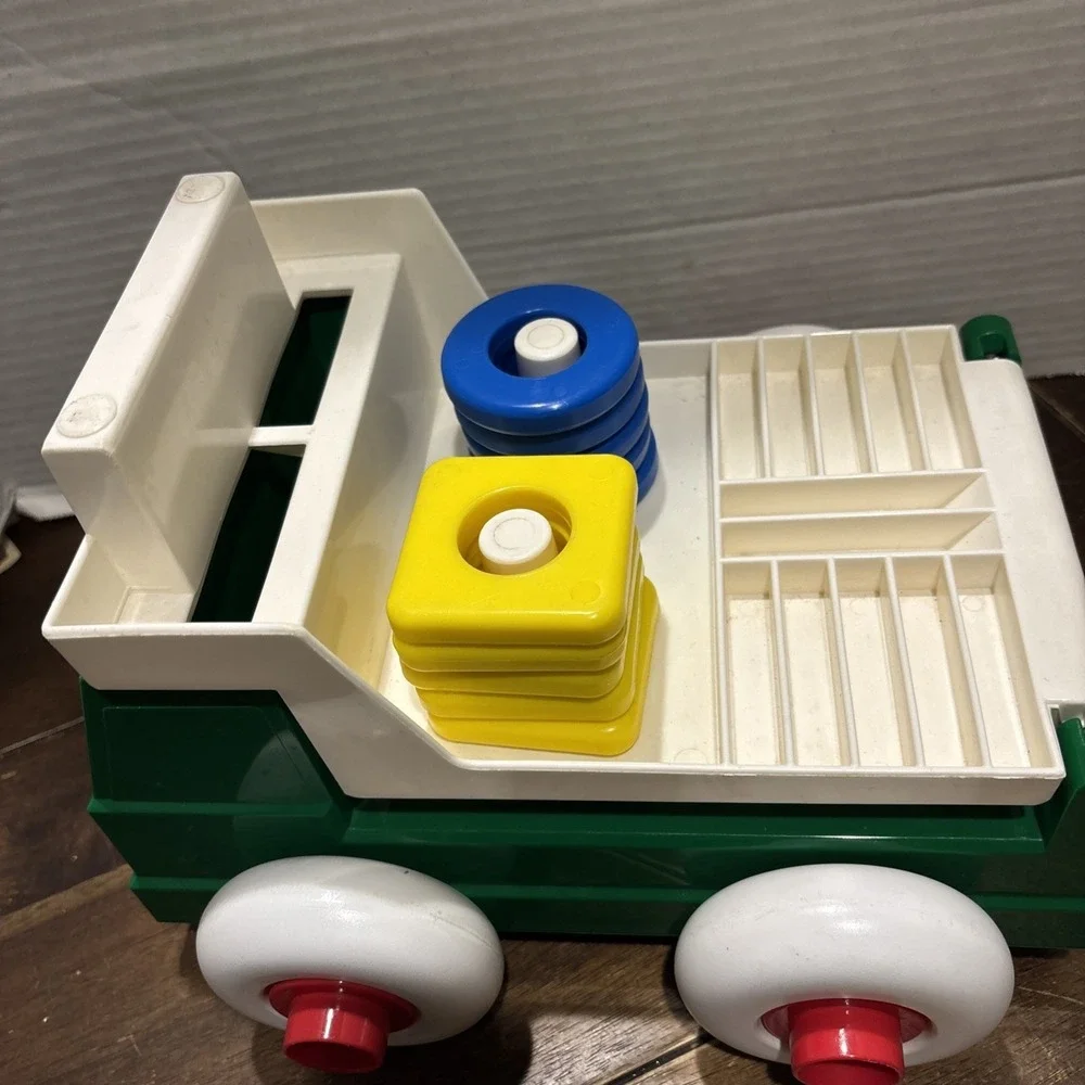 Vintage Johnson & Johnson Green Truck Toy Stack & Dump with Shapes USA 1983‎